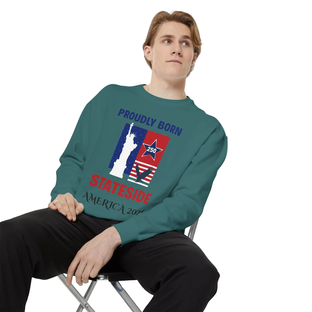 Sweatshirt teal crewneck with patriotic print Proudly Born Stateside and American flag graphics by Printify.