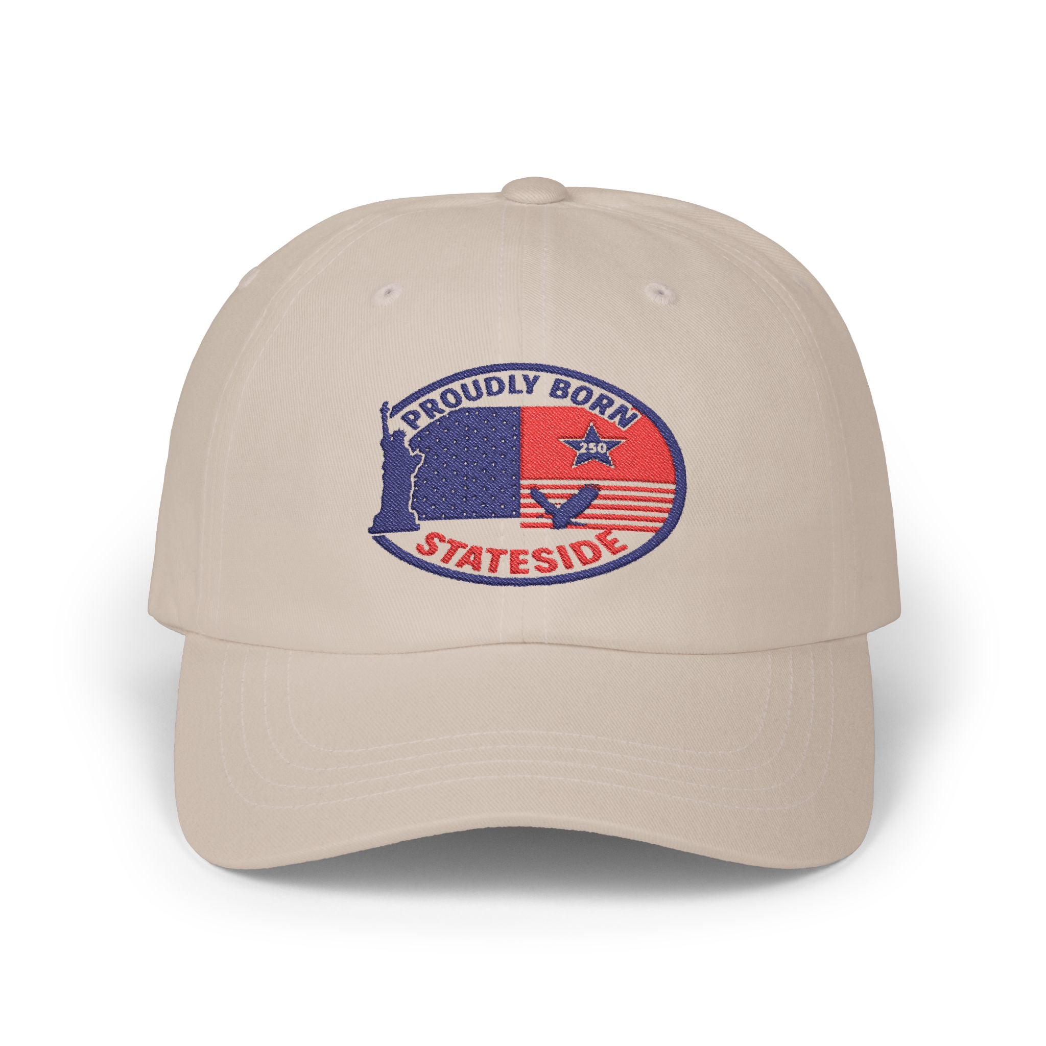 Dad cap with embroidered circular USA patch on beige fabric.