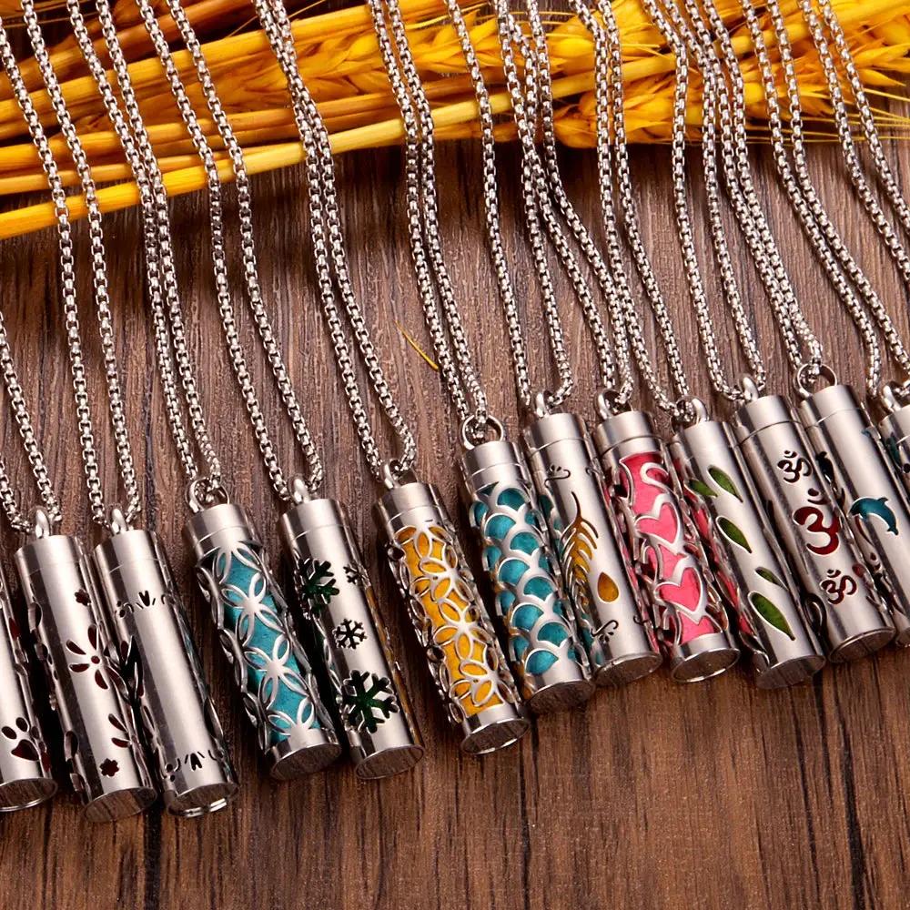 Scent Necklace set by ViralGalleria.com: 12 silver-tone tubes with colorful cutout patterns on chains.