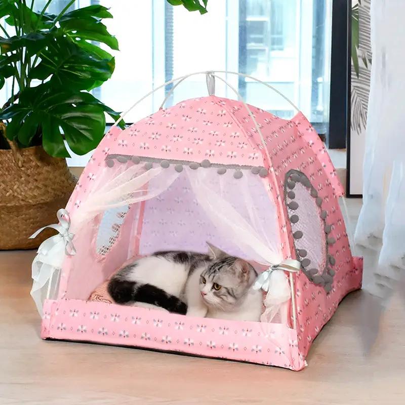 Comfy Calming Pet Tent Bed for Small Dogs and Cats, pink floral dome with sheer mesh, cat resting inside.