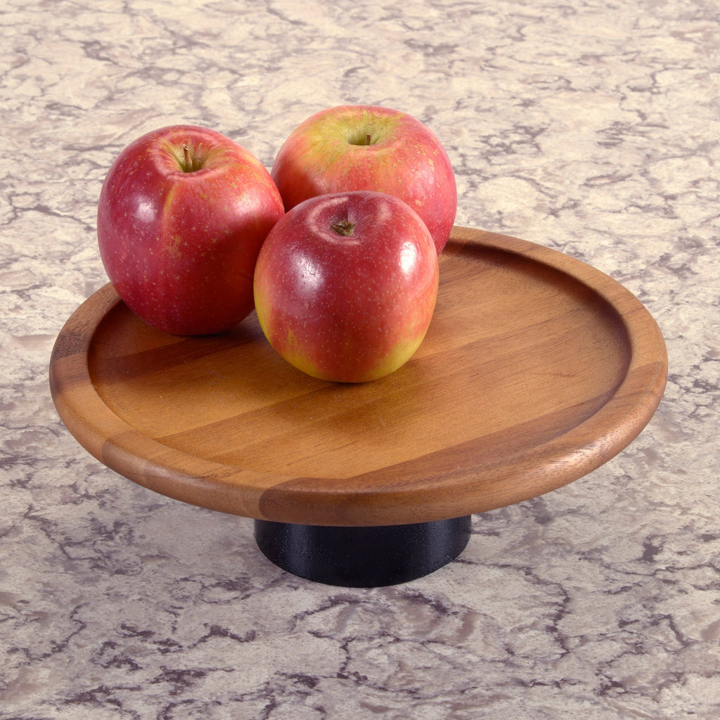 Acacia wood cake stand with black base.