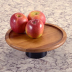 Acacia wood cake stand with black base.