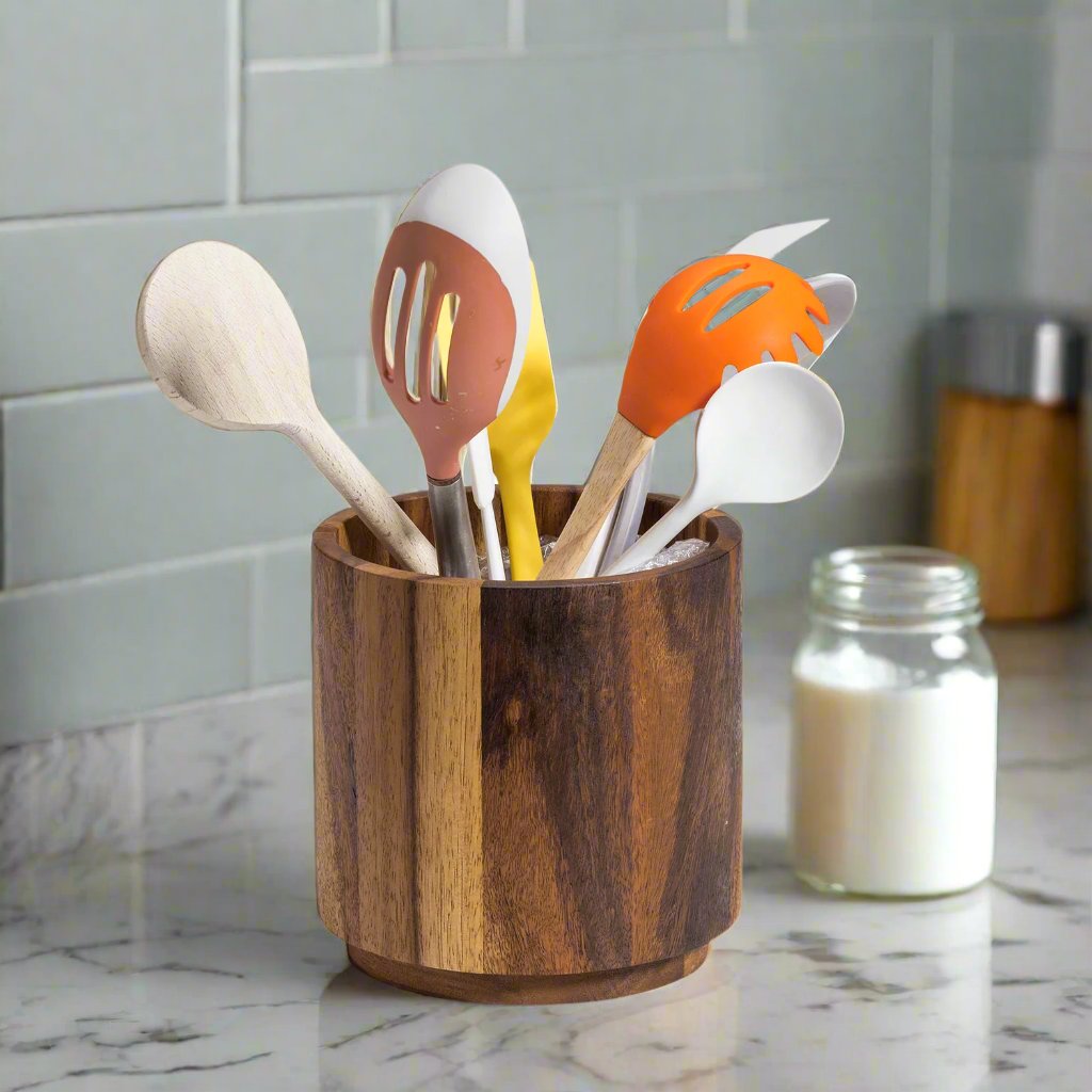 Acacia wood rotating lazy Susan utensil holder.