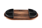 Acacia charcuterie serving tray with black triangular ceramic dishes.