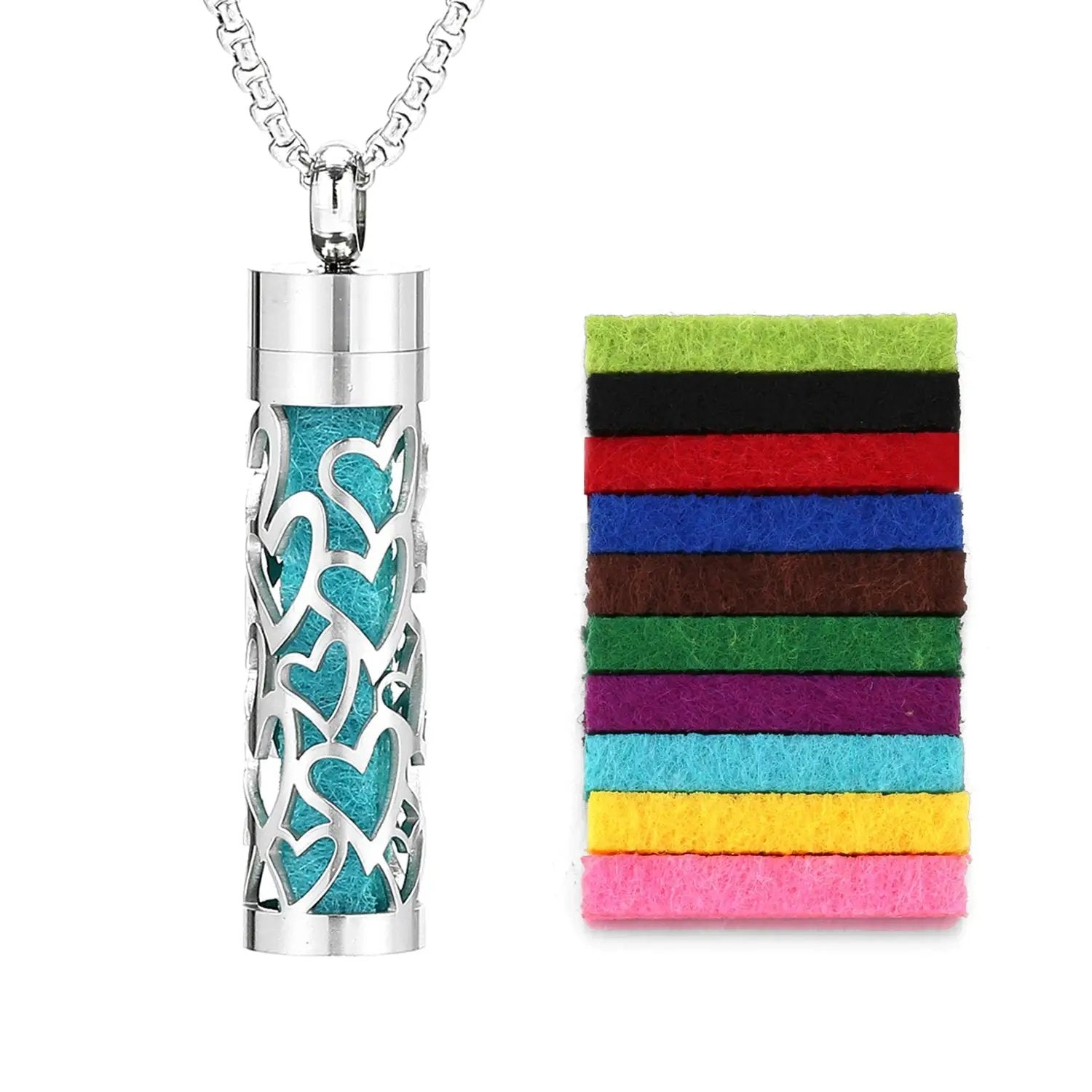 Scent Necklace pendant with teal filigree over turquoise panel on silver chain beside a stack of 10 felt bands.