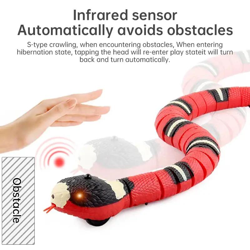 Red interactive cat toy snake with infrared obstacle avoidance for indoor kitten play.