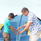 Quick-open beach tent in blue with yellow trim; roomy pop-up sun shelter with 3 vents.