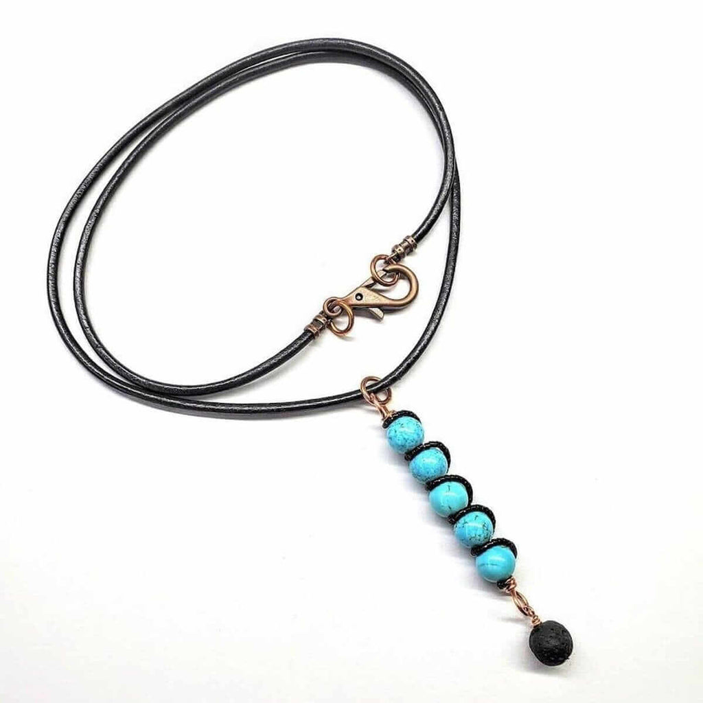 Copper Turquoise Pendant With Lava Rock Charm Necklace by Alexa Martha Designs; black double-wrap cord.