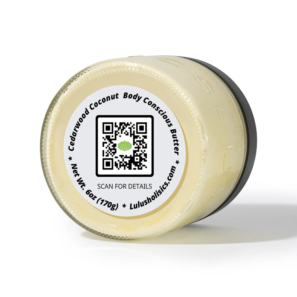 Cedarwood & Coconut Whipped Body Butter jar by Lulu’s Holistics on a beige container