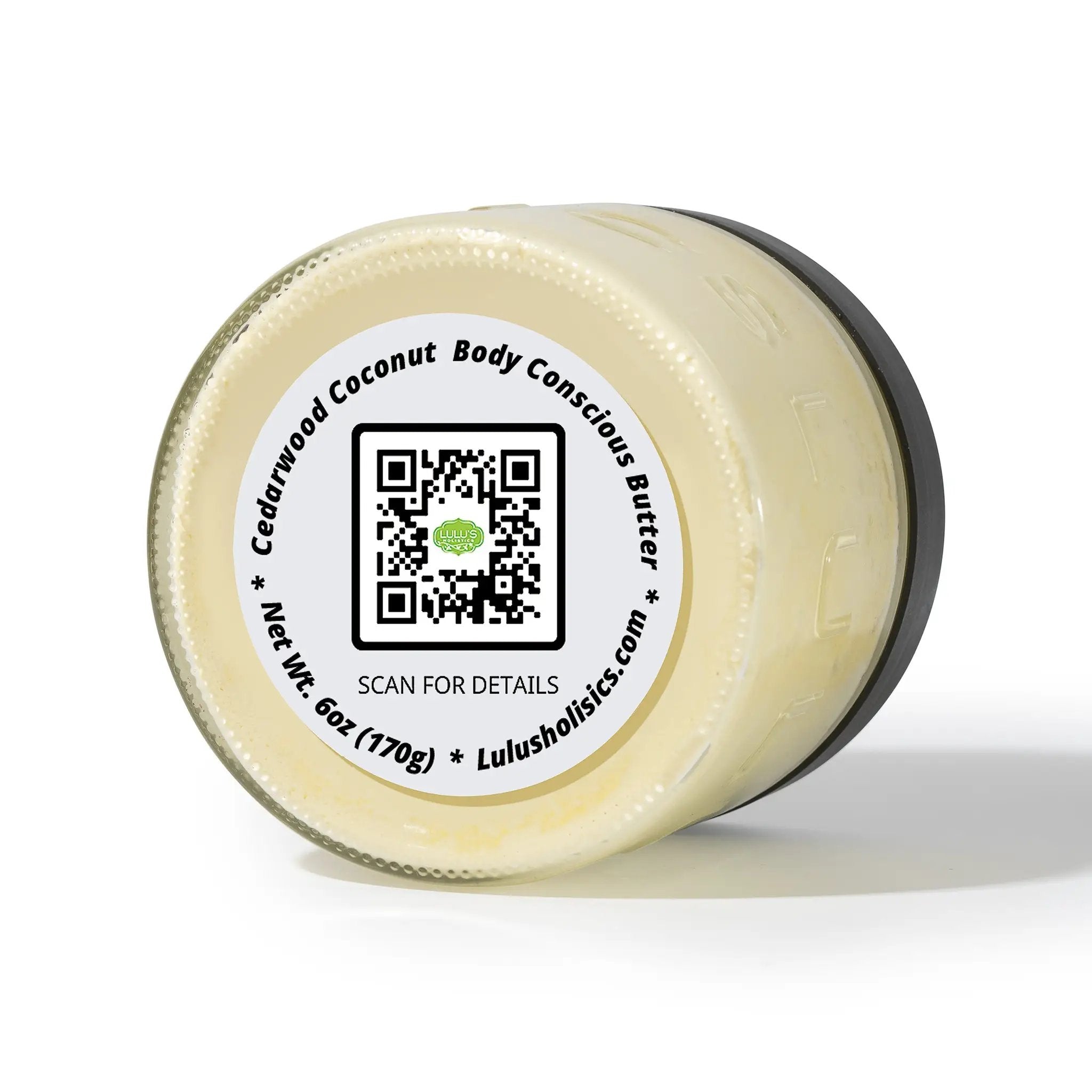 Cedarwood & Coconut Whipped Body Butter jar by Lulu’s Holistics on a beige container