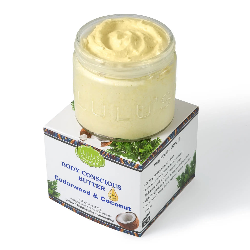 Cedarwood & Coconut Whipped Body Butter jar by Lulu’s Holistics, creamy pale-yellow atop its box