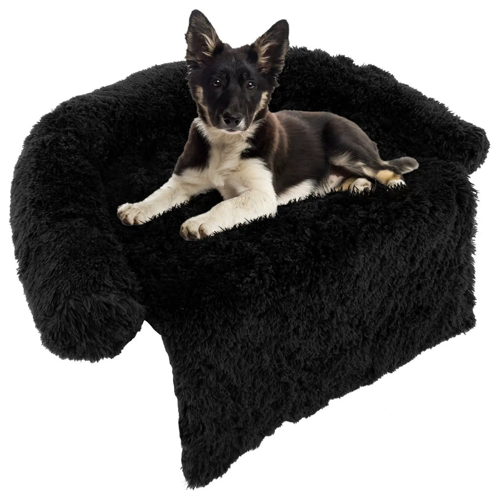 Plush Calming Dog Couch Bed in black with anti-slip bottom, dog resting on fluffy bed.
