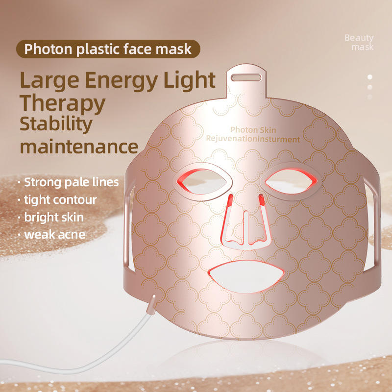 Rose-gold silicone LED face mask with geometric pattern, wired connection, suitable for light therapy