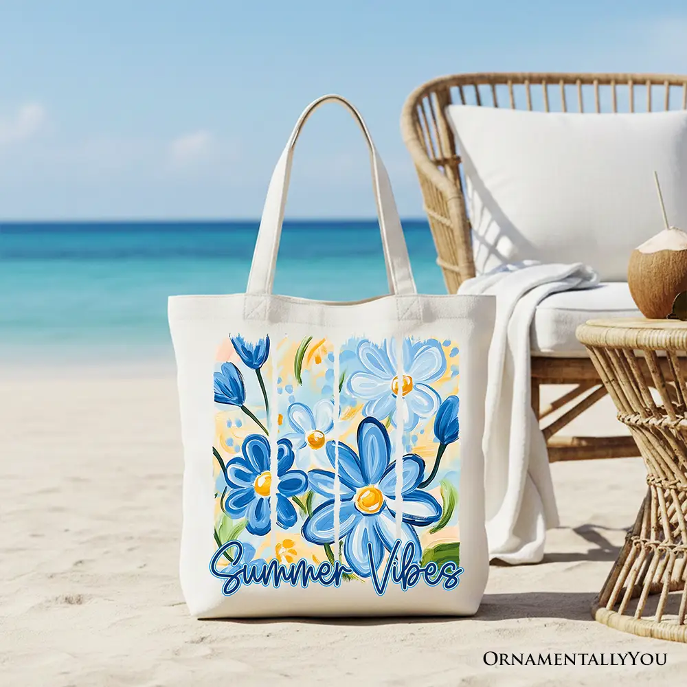 Tote bag with blue brushstroke flowers on white background by OrnamentallyYou
