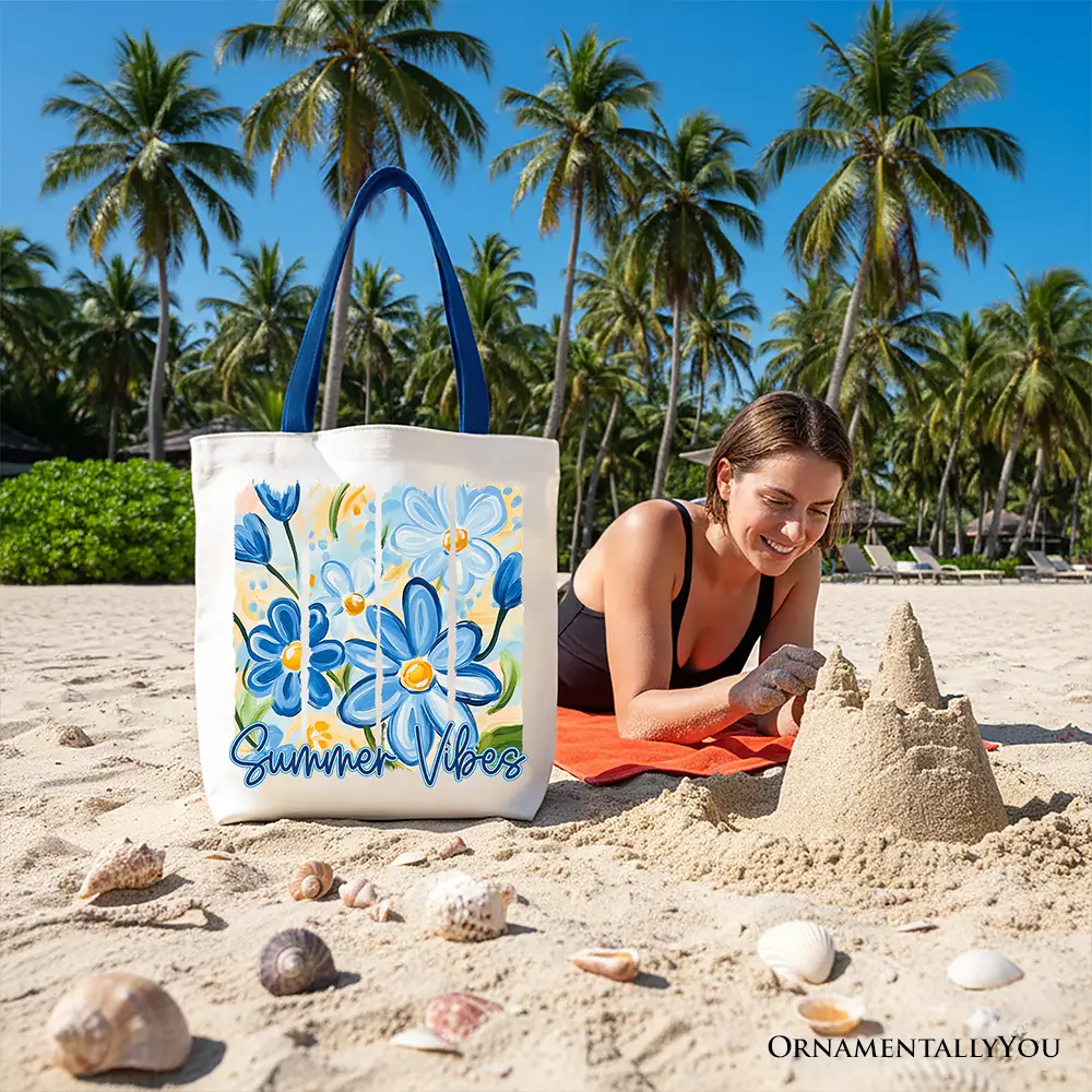 Tote bag featuring blue brushstroke floral design and blue handles by OrnamentallyYou, Summer Vibes.