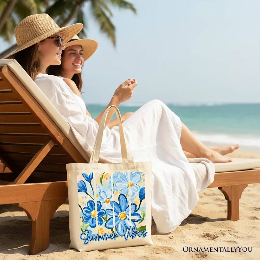 Tote Bag Summer Vibes Brushstroke Flowers by OrnamentallyYou; blue floral canvas tote on beach.