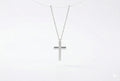 Sterling silver cross necklace in silver, gold, and rose gold finishes.