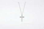 Sterling silver cross necklace in silver, gold, and rose gold finishes.