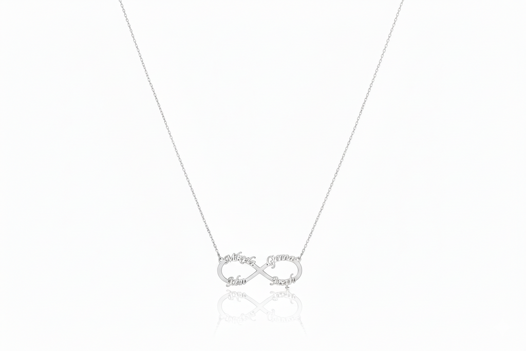 Personalized sterling silver infinity family name necklace.