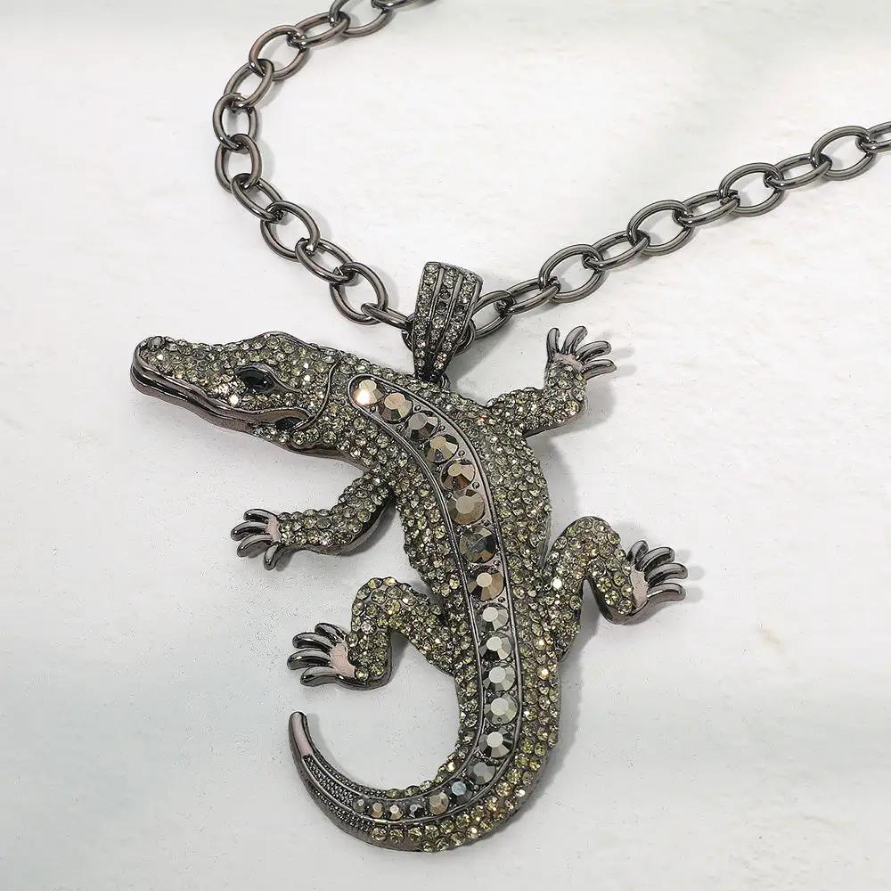 Bold bling alligator pendant necklace on a chunky gunmetal chain with pave crystals