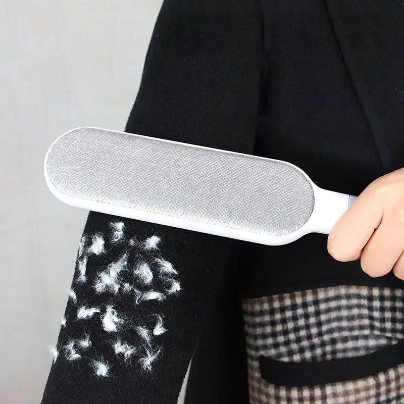 Stevvex Pet Hair Remover double-sided lint brush, white handle with metal mesh, removing fur from clothing