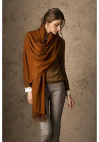 Orange 100% vicuña shawl.