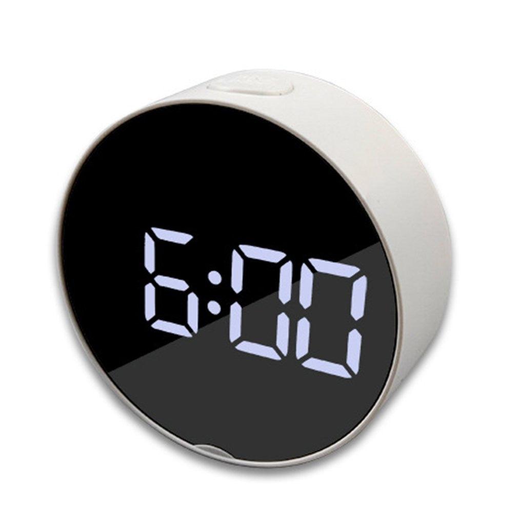 Digital alarm clock by Stevvex with a large LED display on a curved mirror surface