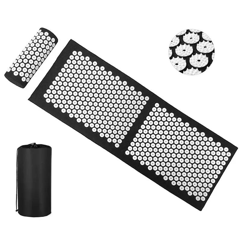 Drip Sweat Lotus Wellness Acupressure Mat with Pillow, black mat with white acupressure studs and a carrying bag