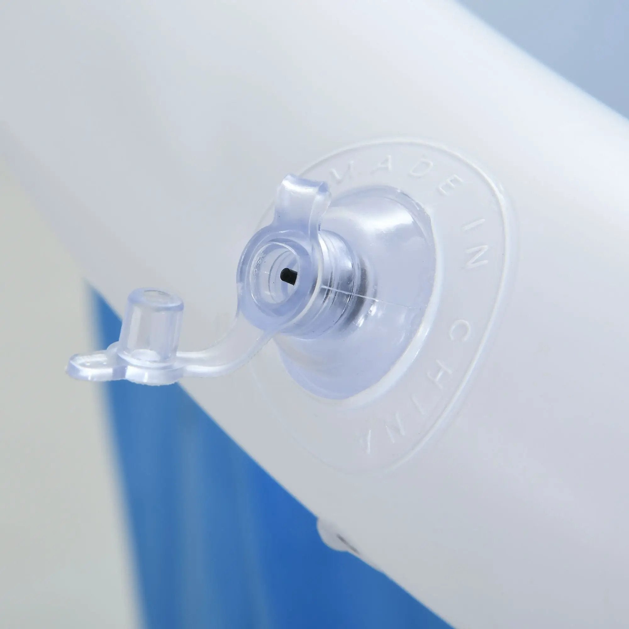 Cold Plunge Tub with clear plastic valve, white body against blue background