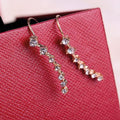 Eloisa Seven Diamond Drop Earrings In Stainless Steel With Rhinestones by STATESIDE NOVA