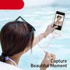 Stevvex floating waterproof phone pouch for swimming, clear 7.2-inch case with pink lanyard.