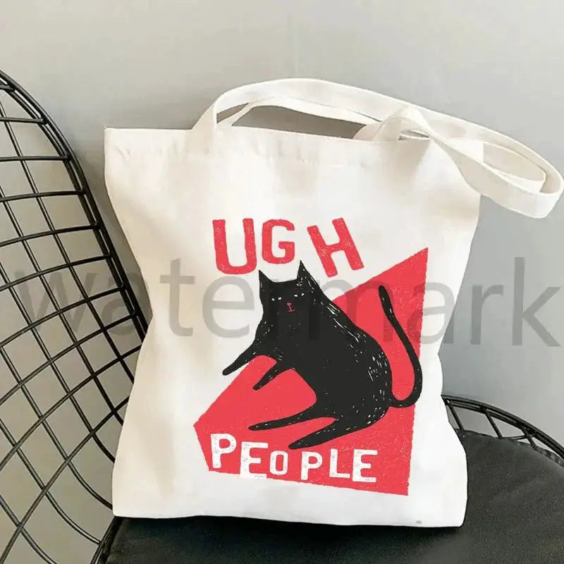 Kpop tote bag white with black cat graphic on red square and UGH PEOPLE text