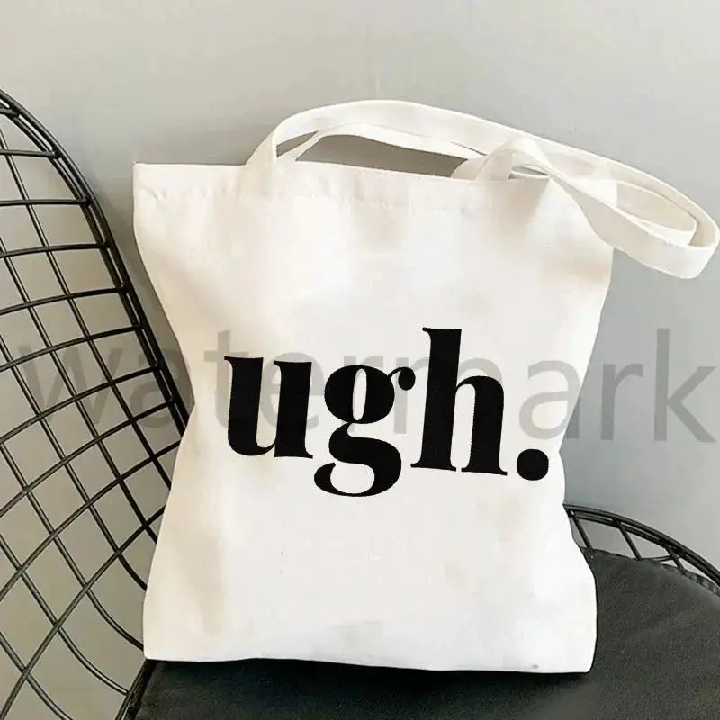 Kpop tote bag by WIVAStore; white canvas shopping tote with bold black ugh print.