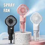 Handheld spray fan by Stevvex; USB rechargeable mini fan in black, pink, white with water-mist cooling.