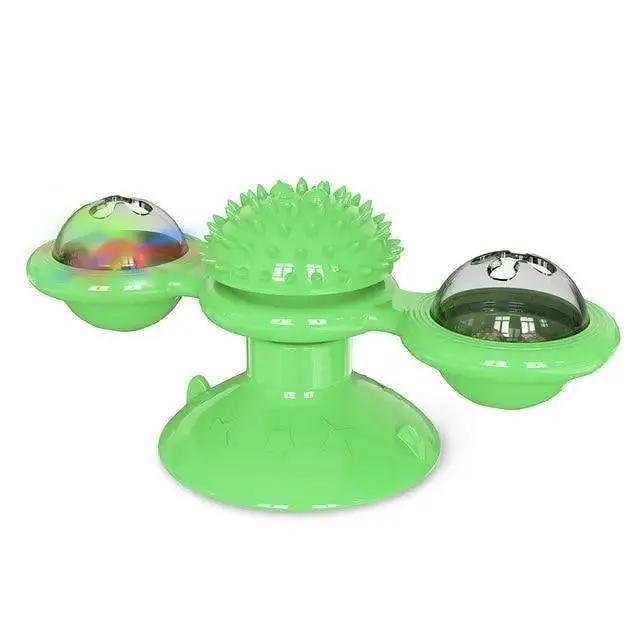 Stevvex rotatable cat toy in bright green with a spiky massage center and two LED light-up balls on rotating arms