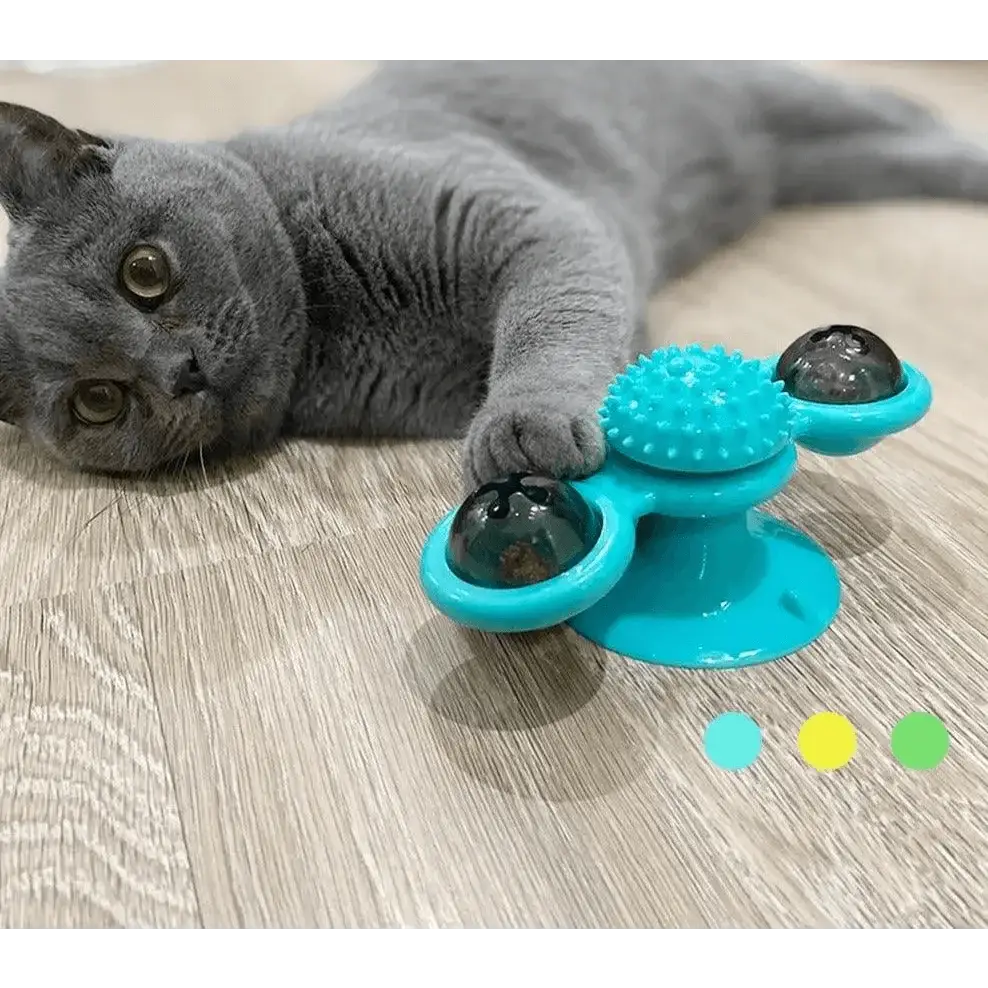 Rotatable Stevvex cat toy with windmill massage ball and LED spheres, teal blue